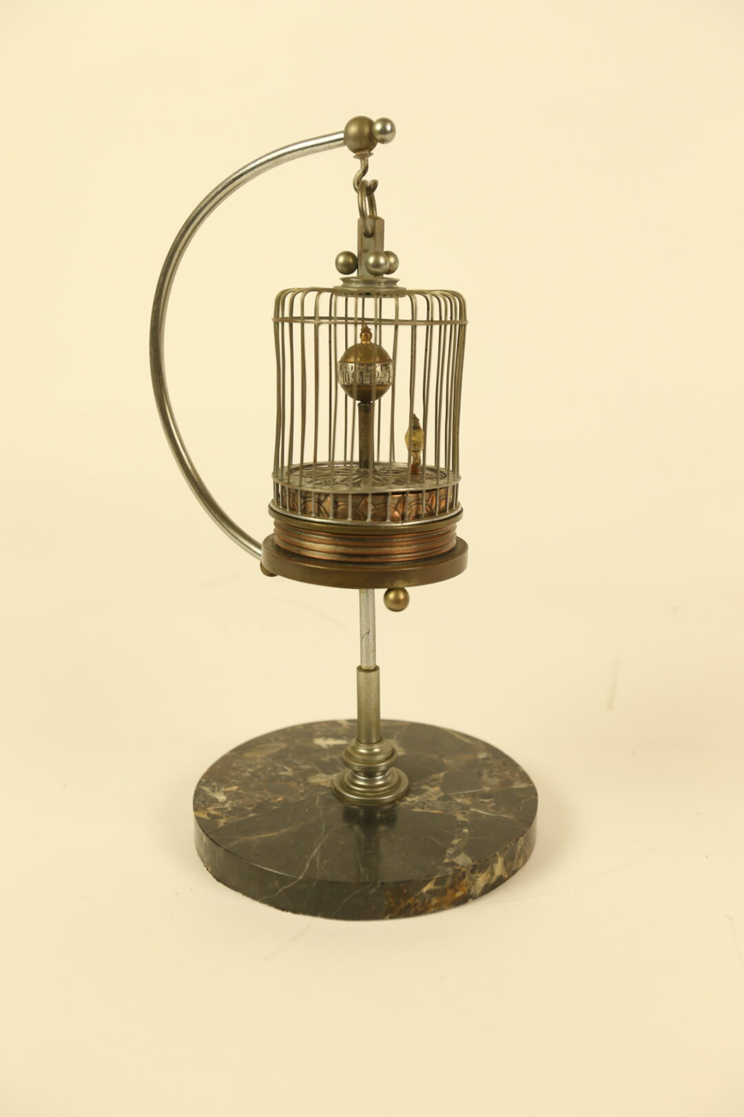 Novelty bird in cage clock circa 1950s