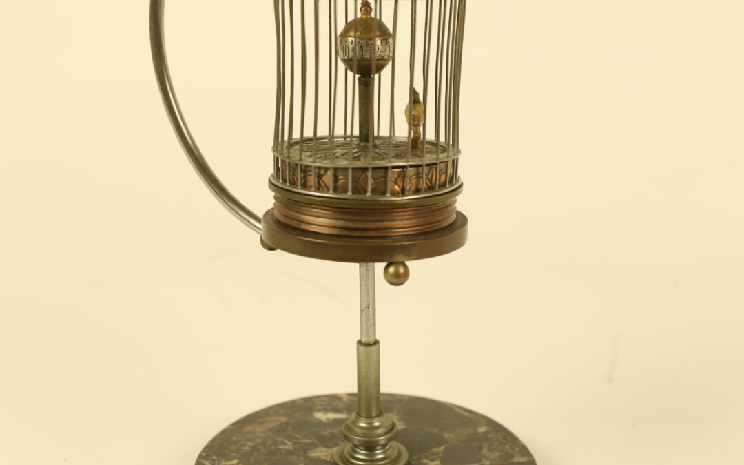 Novelty bird in cage clock circa 1950s